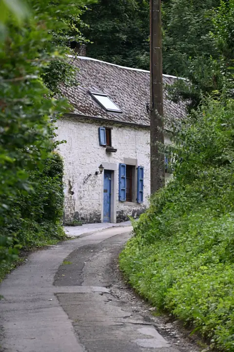 Slide 1: the village street